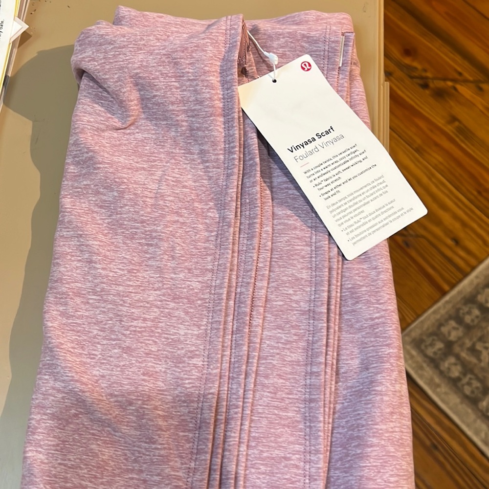 Lululemon vinyasa scarf.  Heathered pink color